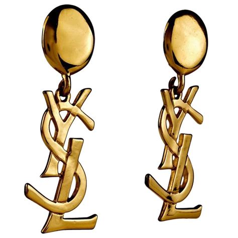 ysl logo earrings gold|YSL lipstick earrings.